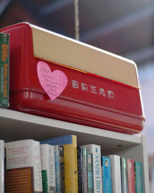 Metal bread box on a kitchen counter