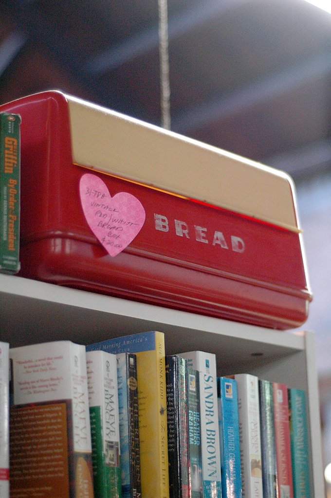 Metal bread box on a kitchen counter