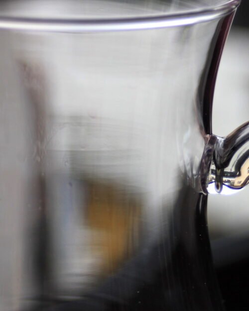 Clear glass water carafe on a table
