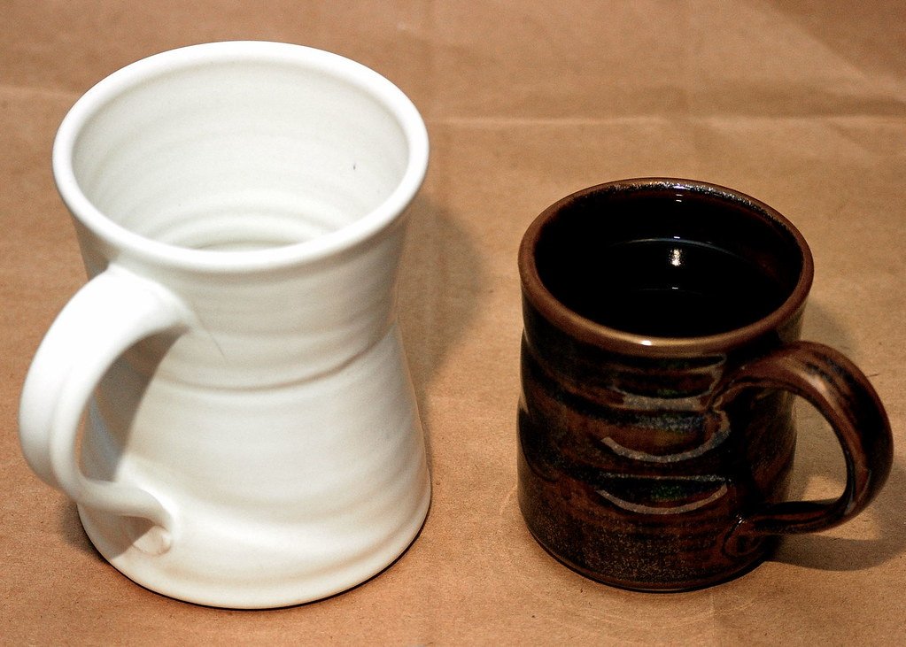Two ceramic mugs shown side by side